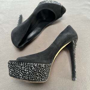 Brian Atwood black suede peep toes heels with crystals.